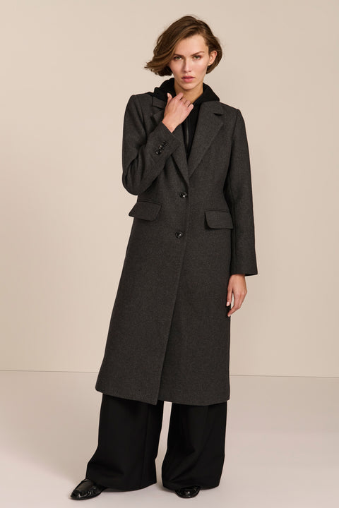 women's wool coat with a notched collar, flap pockets and zip-front hooded knit bib.