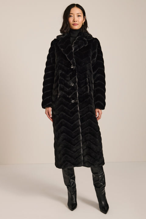 Long faux fur coat with chevron-textured finish, notch collar, button-front closure and full-length silhouette