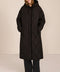 Oversized long puffer coat with diamond quilting, corduroy trim, hood, welt pockets, and Ecoplume insulation.