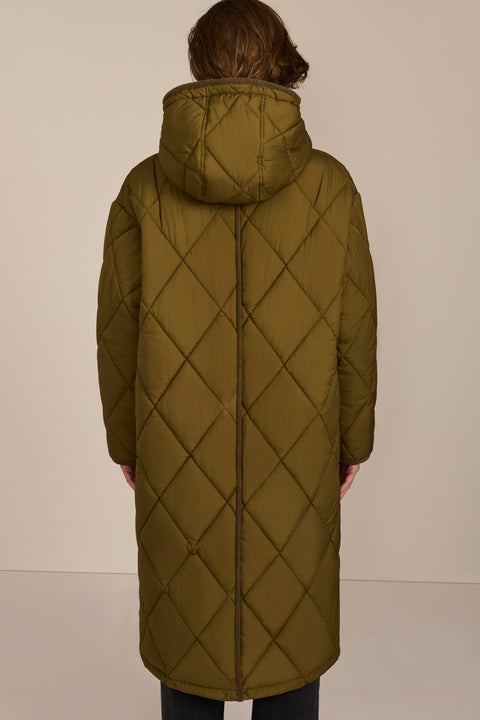 Oversized long puffer coat with diamond quilting, corduroy trim, hood, welt pockets, and Ecoplume insulation.