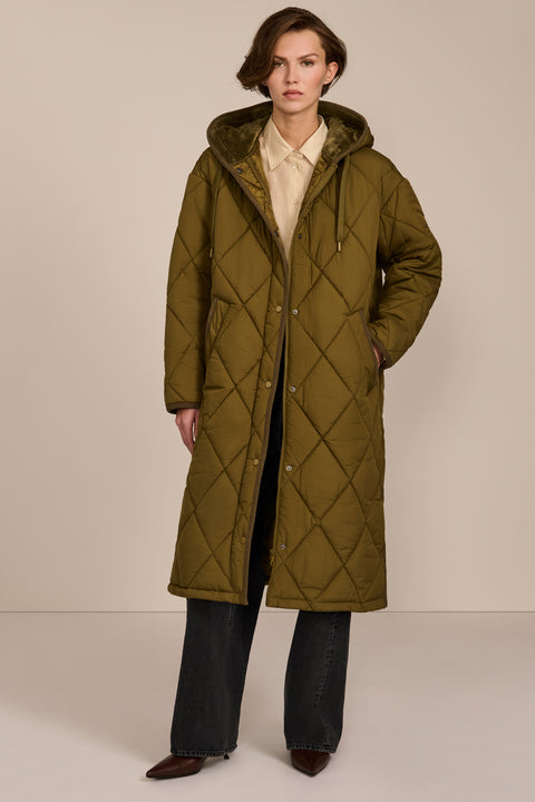 Oversized long puffer coat with diamond quilting, corduroy trim, hood, welt pockets, and Ecoplume insulation.