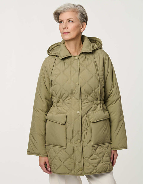 Women’s quilted utility jacket with flap pockets, snap front closure, attached hood, and cinched drawstring waist.
