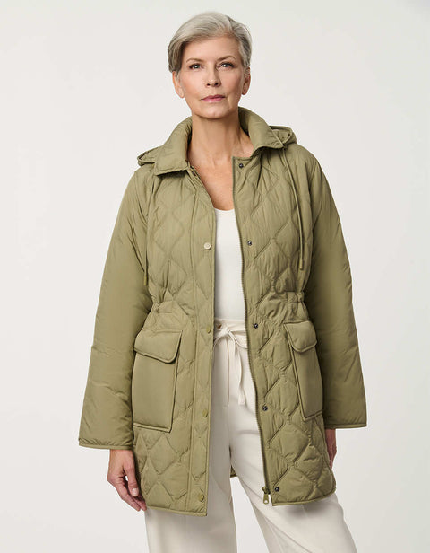 Women’s quilted utility jacket with flap pockets, snap front closure, attached hood, and cinched drawstring waist.