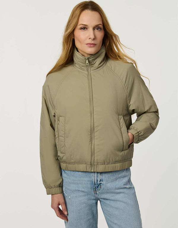 Women’s lightweight cloudweight jacket with a clean, modern silhouette for transitional weather.