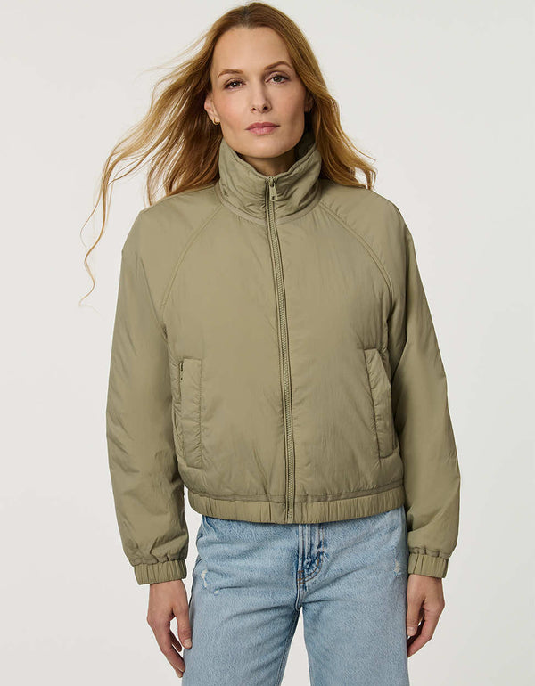 Women’s lightweight cloudweight jacket with a clean, modern silhouette for transitional weather.