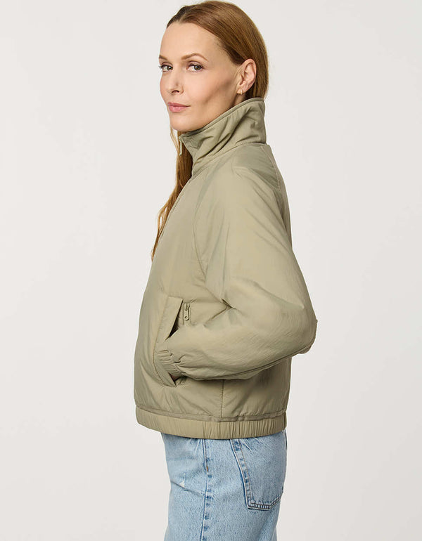 Women’s lightweight cloudweight jacket with a clean, modern silhouette for transitional weather.