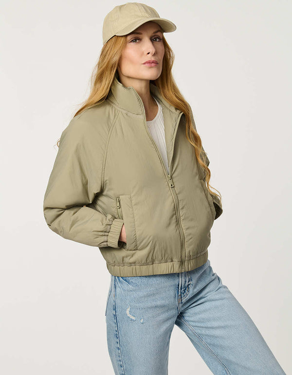 Women’s lightweight cloudweight jacket with a clean, modern silhouette for transitional weather.