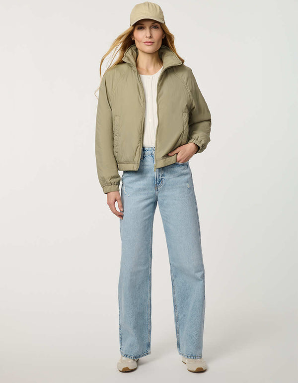 Women’s lightweight cloudweight jacket with a clean, modern silhouette for transitional weather.