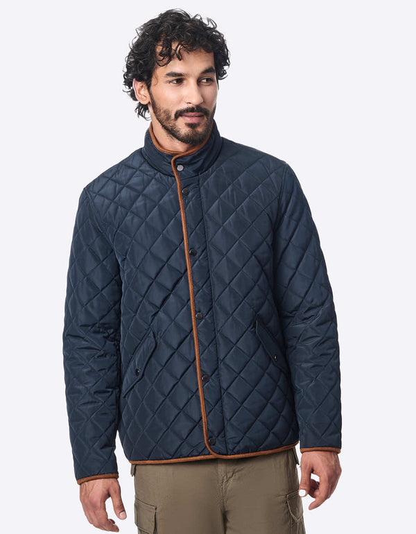 Men's quilted lightweight jacket made with sustainable materials. Contrast lining and suede collar make it a jacket with effortless style.