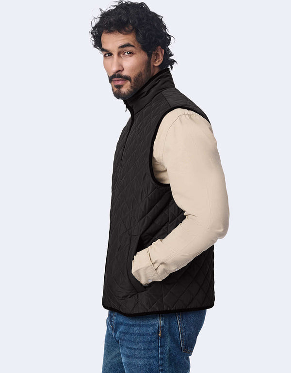 mens black quilted vest made from recycled materials with two way zipper for a polished look