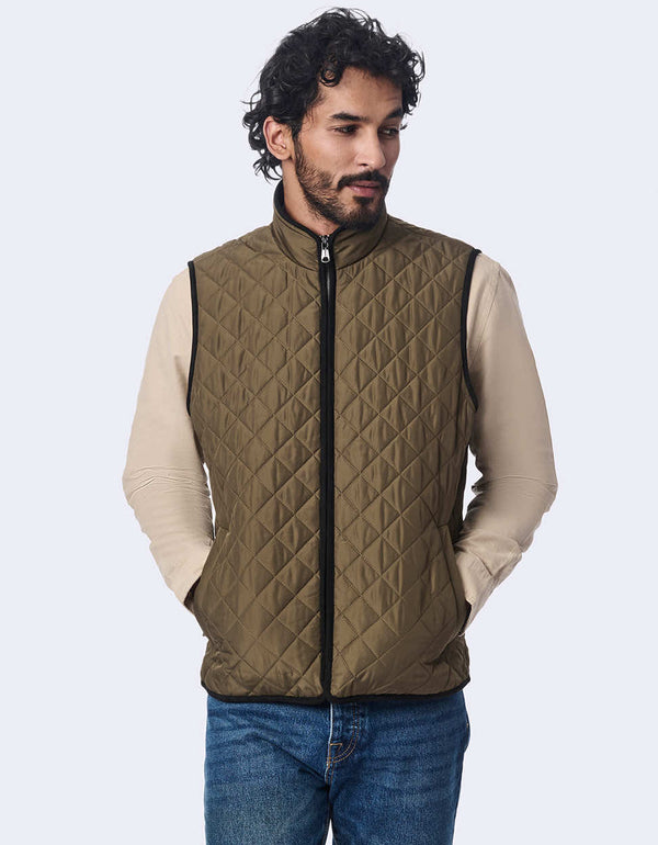 mens olive quilted vest featuring eco insulation and a clean two way zipper for a stylish outdoor look