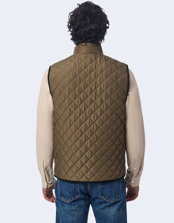 men's quilted vest made with sustainable materials. Lightweight style with contrast lining and two-way zipper.