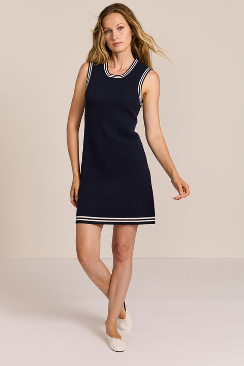 women's navy sleeveless knit mini dress with ivory striped trim at the neckline, armholes and hem.