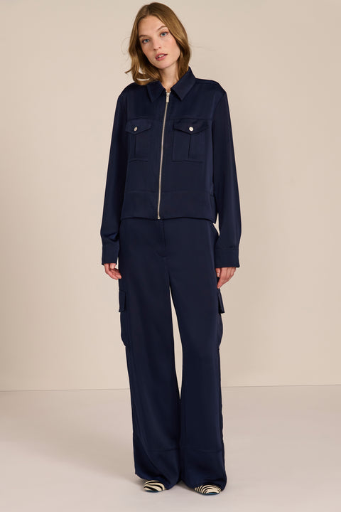 women's navy satin-finish zip-front utility jacket with pointed collar, flap chest pockets and silver-tone hardware.