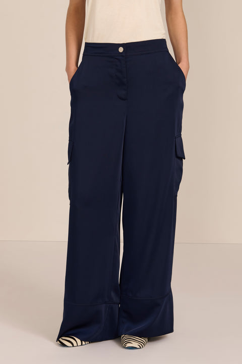 women's satin-finish wide-leg cargo pants with flap pockets and silver-tone snap hardware.