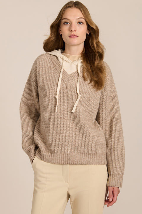 women's V-neck sweater with a contrast ivory hood, drawstrings, dropped shoulders and ribbed knit texture.