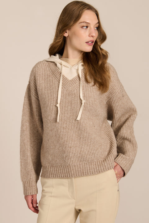 women's V-neck sweater with a contrast ivory hood, drawstrings, dropped shoulders and ribbed knit texture.