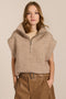 women's cable knit quarter-zip sweater vest with ribbed funnel collar, textured cable stitching and relaxed cap sleeves.