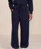 Women's soft scuba wide-leg pants with light blue piping, patch pockets, drawstring waist and side slits.