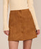 women's camel faux suede mini skirt featuring a tonal covered snap front and clean A-line silhouette.