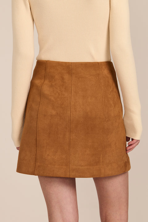women's camel faux suede mini skirt featuring a tonal covered snap front and clean A-line silhouette.
