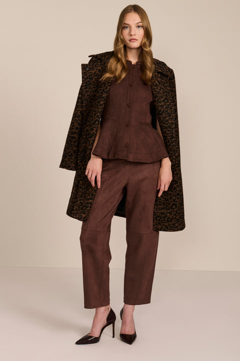 women's chocolate brown faux suede peplum top featuring a sleeveless silhouette, band collar, tonal covered buttons and flared hem.