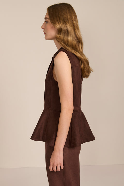 women's chocolate brown faux suede peplum top featuring a sleeveless silhouette, band collar, tonal covered buttons and flared hem.