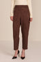 women's chocolate brown faux suede pull-on pant featuring an elasticized waistband, side pockets, seam detailing and an ankle-length silhouette.