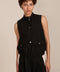 women's black sleeveless utility bomber vest featuring a stand collar, snap-front closure, flap pockets and elasticized hem.