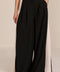 women's high-rise wide-leg pants featuring front pleats and contrasting ivory side stripes.