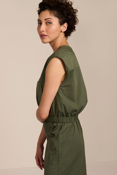 women's olive sleeveless zip-front top with V-neckline, extended shoulders and elasticized hem.