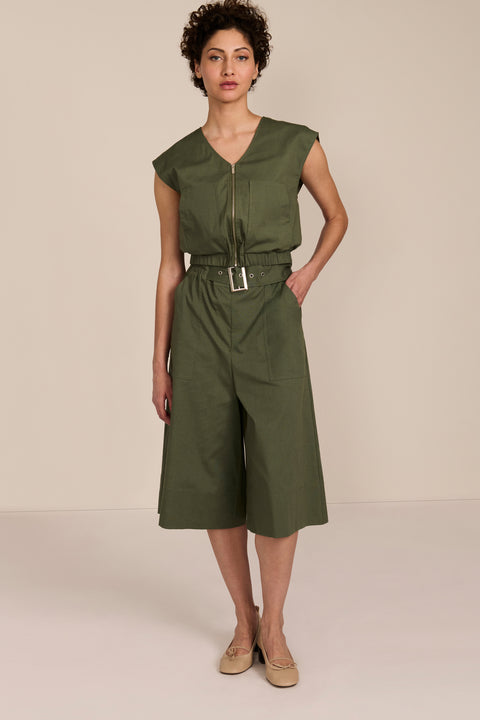 women's olive sleeveless zip-front top with V-neckline, extended shoulders and elasticized hem.