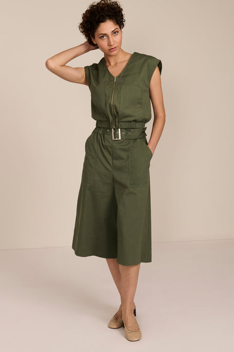 women's olive sleeveless zip-front top with V-neckline, extended shoulders and elasticized hem.