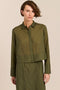 women's cropped button-front shirt in olive green with point collar, long sleeves and wide cuffs,