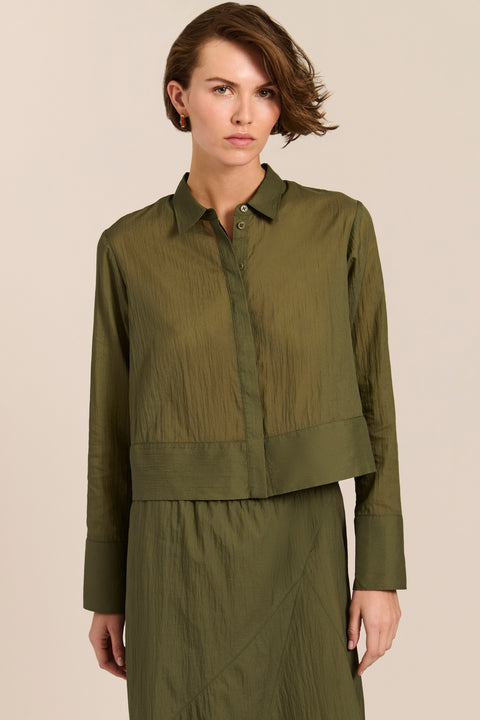 women's cropped button-front shirt in olive green with point collar, long sleeves and wide cuffs,