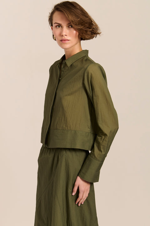 women's cropped button-front shirt in olive green with point collar, long sleeves and wide cuffs,