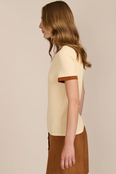 women's ivory ribbed knit short-sleeve tee featuring a crew neckline and warm brown contrast trim at the neck and cuffs.