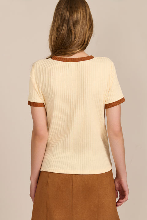 women's ivory ribbed knit short-sleeve tee featuring a crew neckline and warm brown contrast trim at the neck and cuffs.