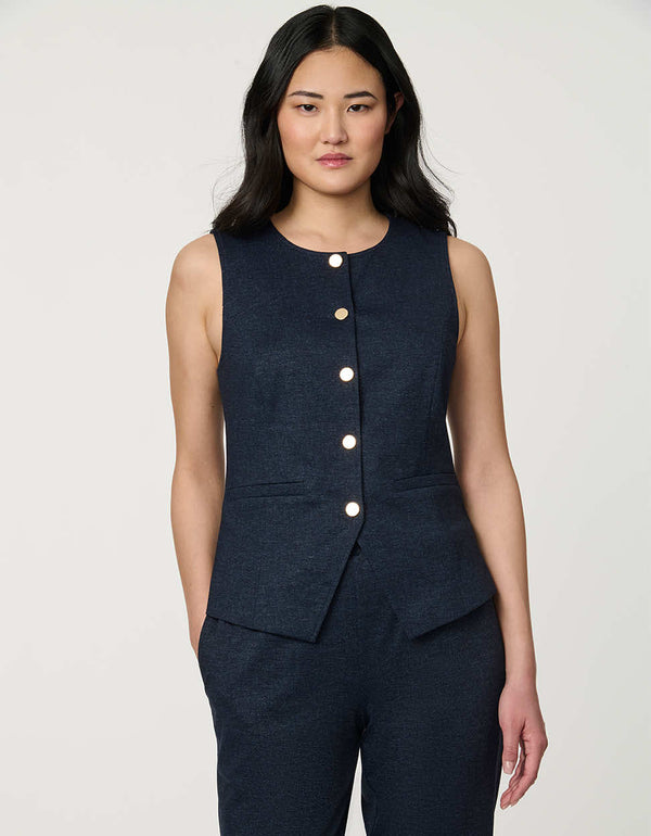 Woman wearing denim-effect Button Down Crew Neck Vest with crew neckline and tailored sleeveless silhouette.