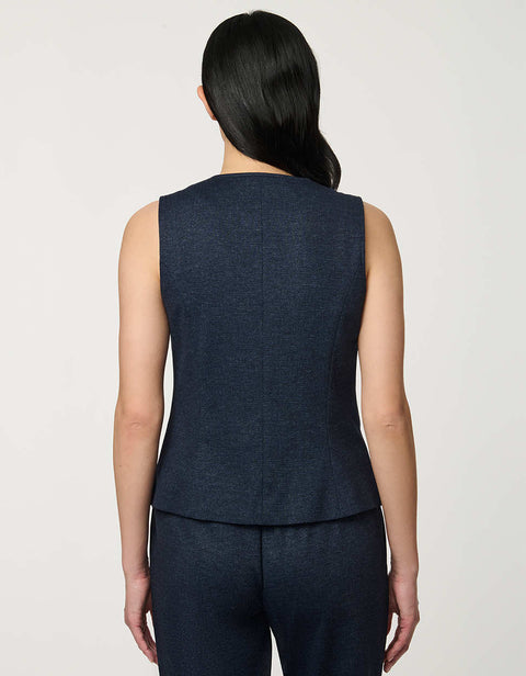 Woman wearing denim-effect Button Down Crew Neck Vest with crew neckline and tailored sleeveless silhouette.