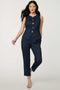 Woman wearing denim-effect Button Down Crew Neck Vest with crew neckline and tailored sleeveless silhouette.