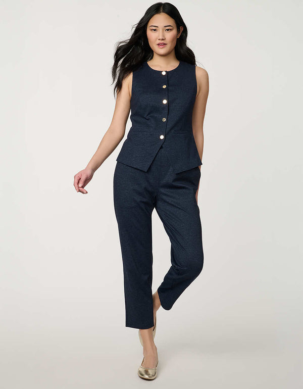 Woman wearing denim-effect Button Down Crew Neck Vest with crew neckline and tailored sleeveless silhouette.