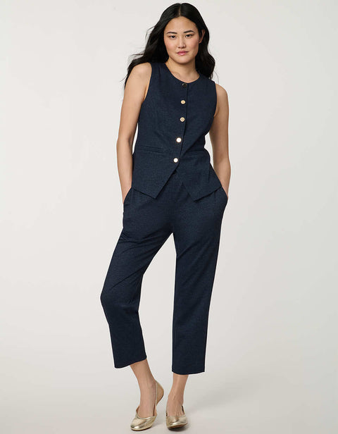Woman wearing denim-effect Button Down Crew Neck Vest with crew neckline and tailored sleeveless silhouette.