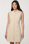 Woman wearing neutral sleeveless Modern Button Down Vest Dress with crew neckline and full button-front closure.