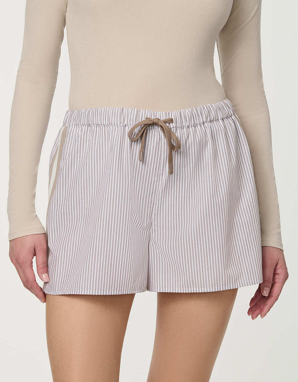 Woman wearing Striped Poplin Short with drawstring waist and vertical side stripe detail.