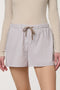 Woman wearing Striped Poplin Short with drawstring waist and vertical side stripe detail.