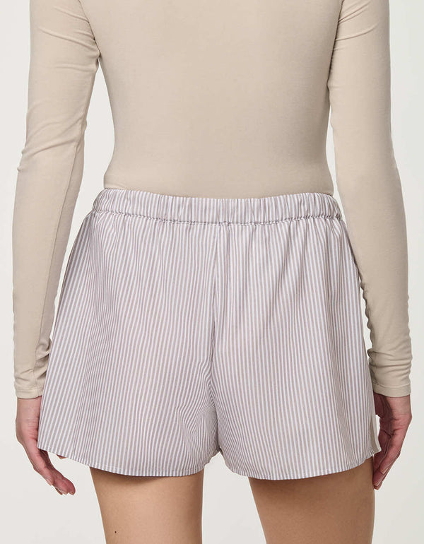 Woman wearing Striped Poplin Short with drawstring waist and vertical side stripe detail.