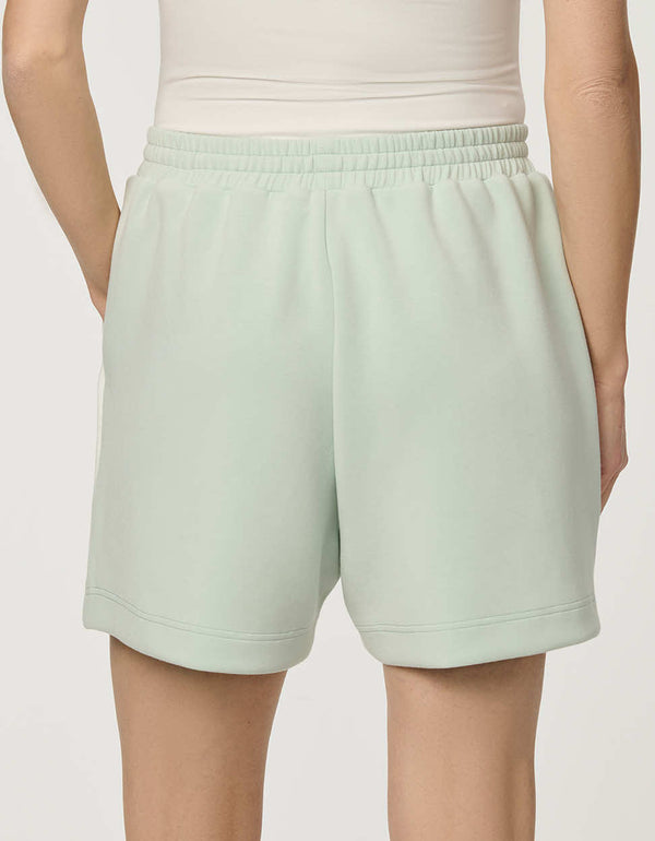 Women’s lightweight scuba short in Green with elastic waistband and relaxed fit.