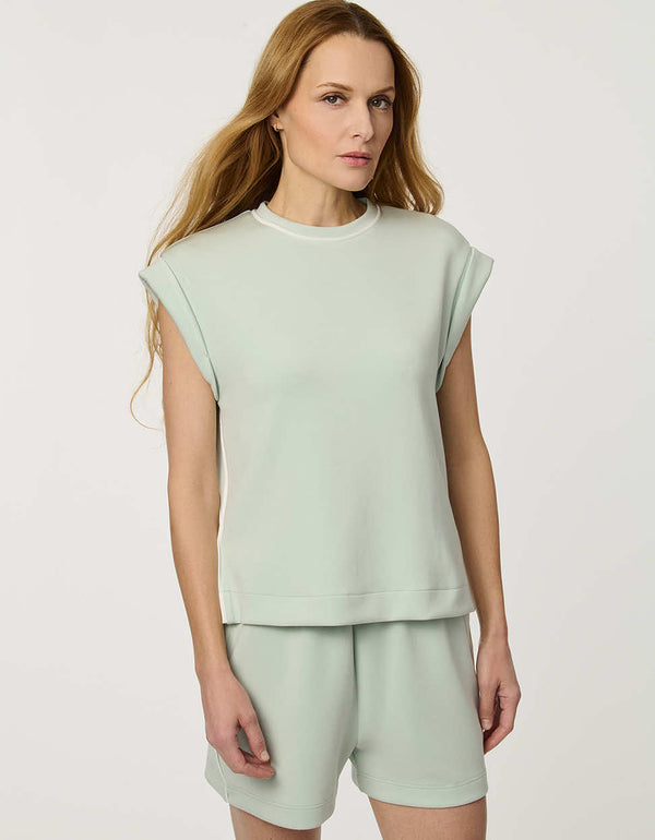 Women’s lightweight scuba tee in Green with cap sleeves and relaxed structured silhouette.