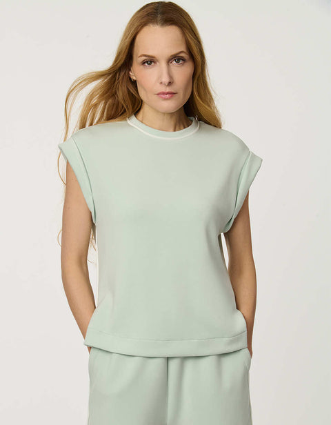 Women’s lightweight scuba tee in Green with cap sleeves and relaxed structured silhouette.